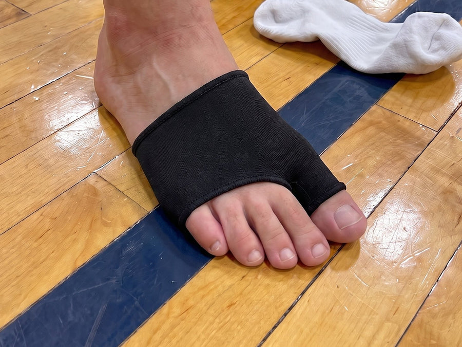 Step 1: sliding the sleeve onto a bare foot