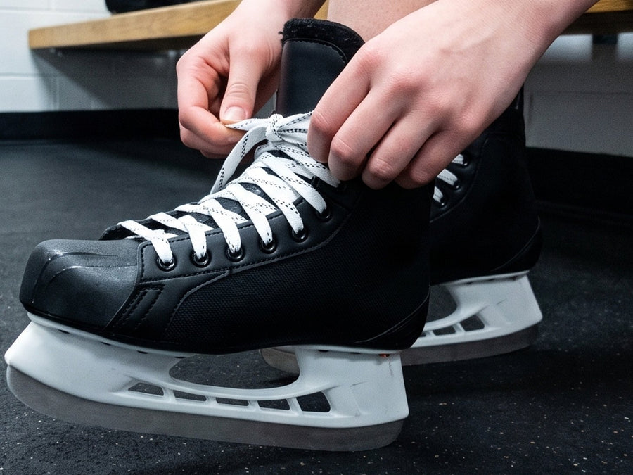 Step 3: slipping the foot into a hockey skate
